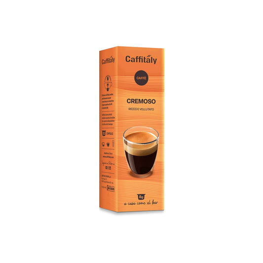 A tall orange box of Caffitaly Cremaso coffee capsules, featuring a graphic of an espresso glass on the front, set against a plain white background.