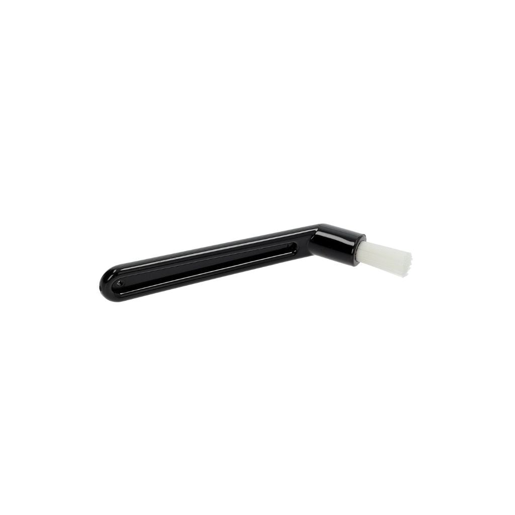 Black plastic tool with a white brush head on a white background