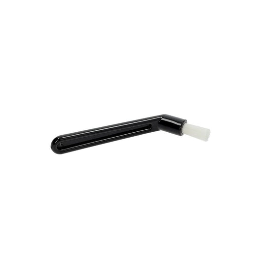 Black plastic tool with a white brush head on a white background